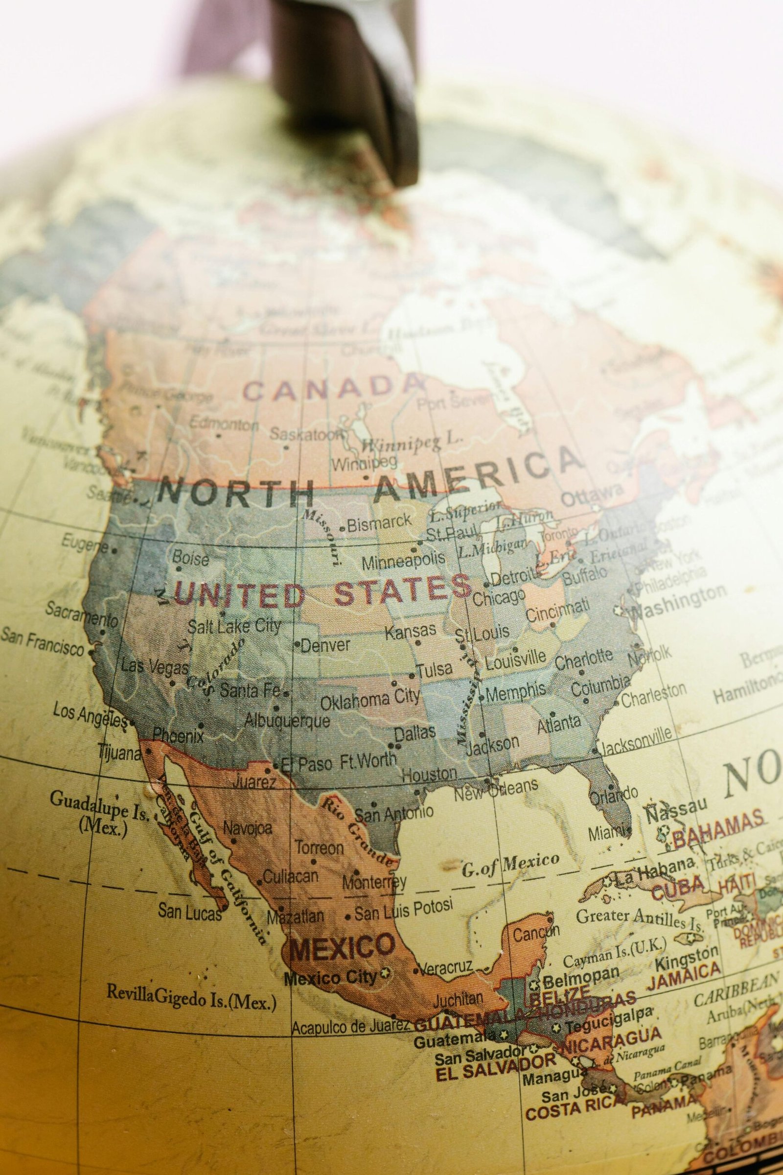 Detailed view of North America on a classic globe featuring Canada and the USA.